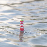 Trixie Hundespielzeug Aqua Toy Leuchtturm am Seil